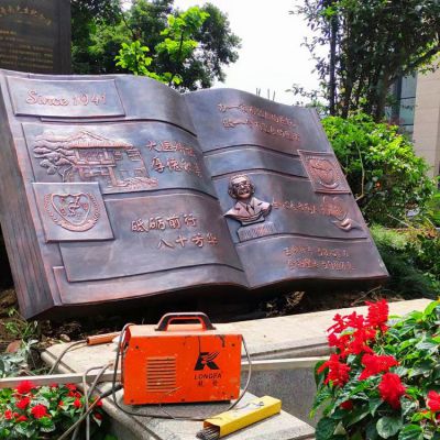 銅雕書，學(xué)校校園景觀雕塑